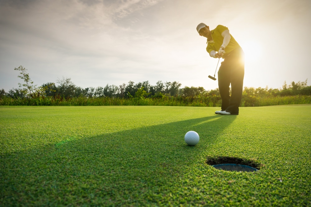 Man playing golf