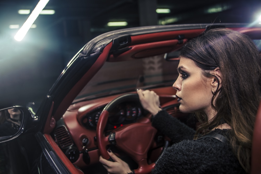 Woman in Luxury Car